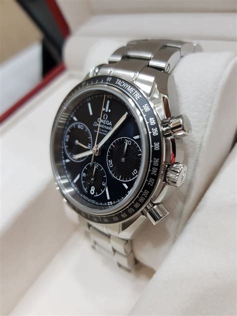 omega speedmaster co axial 40 mm|pricing difference between omega speedmaster.